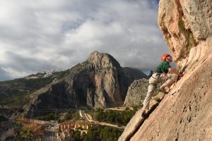 Cameron Hygate heading up to the chain on his first 6a Lobo at Sierra De Toix, Costa Blanca