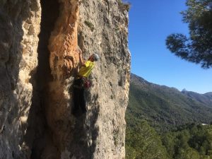 Simon climbing Garrofer 6a+ at the beautiful Guadalest