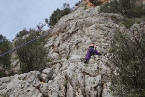 Climbing the great Hogfather 5c at Alcalali, Xalon Valley, Costa Blanca