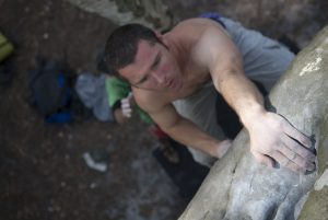 Naill Focused on the next holds.